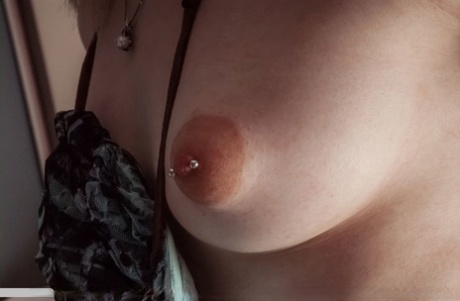 Sexy slut Kelly flashes hot upskirt & gives closeup of pierced nipples & pussy